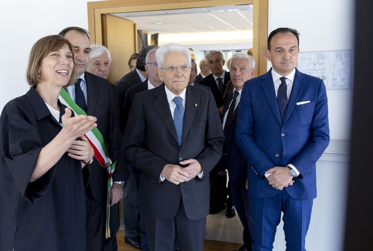 Il Presidente della Repubblica Sergio Mattarella visita la Mostra fotografica allestita in occasione del 60° anniversario della fondazione del Centro internazionale di formazione dell’ILO, illustrata dal Direttore